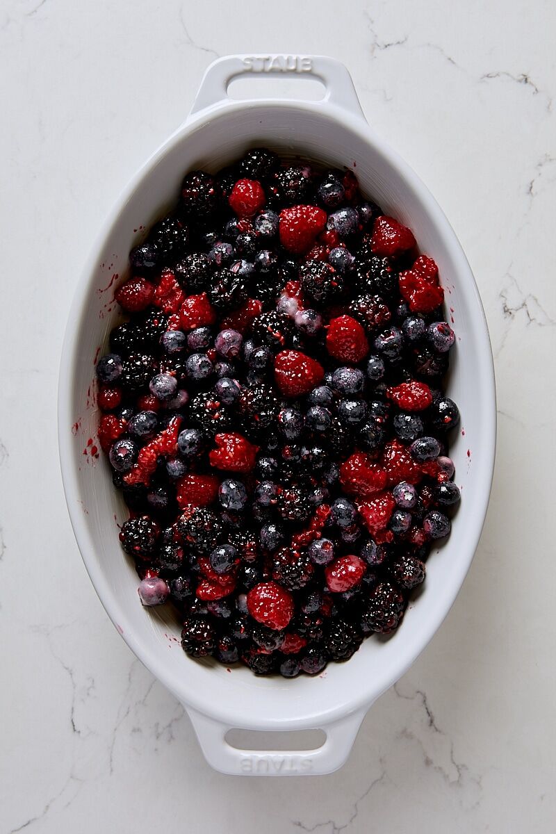 Berry filling spooned into baking dish