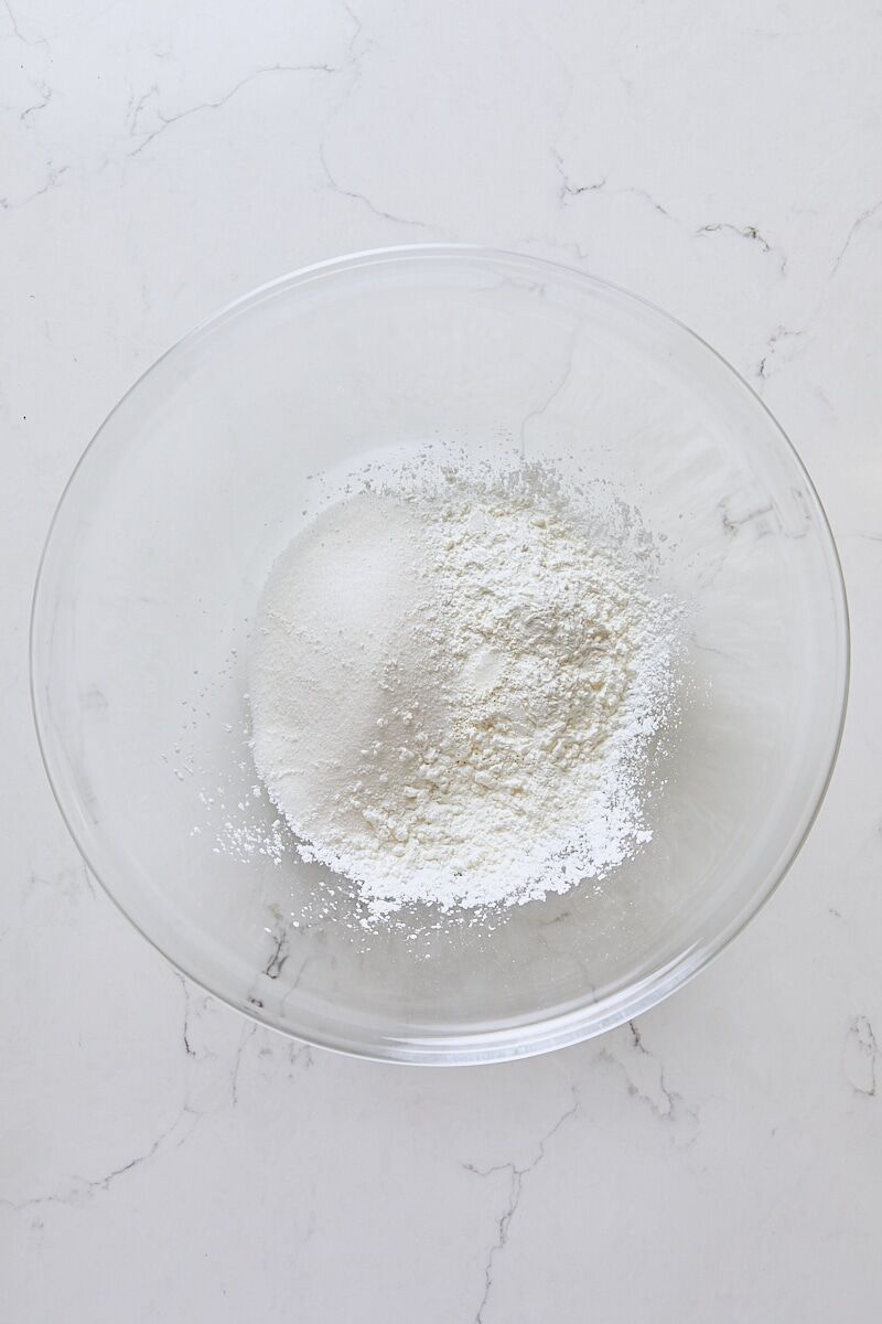 Granulated sugar, arrowroot starch, and salt in large glass bowl