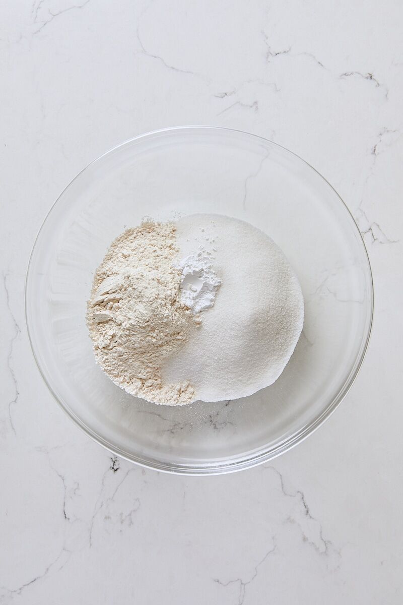 Flour, granulated sugar, baking powder, and salt in medium glass bowl
