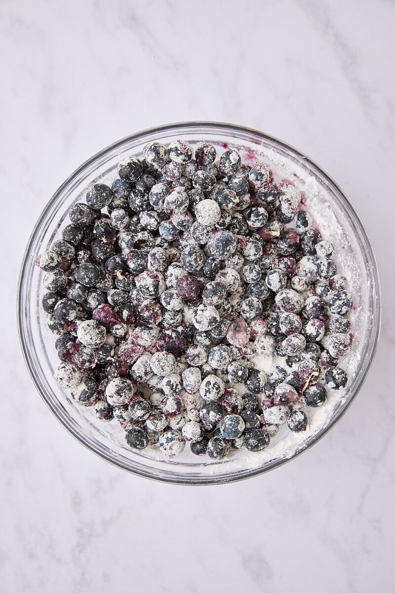 Mixed blueberry crisp filling in glass bowl