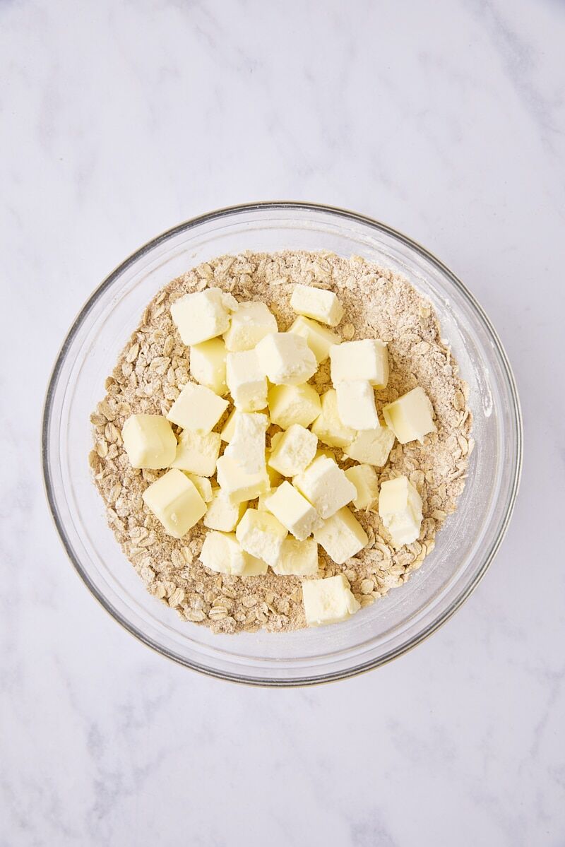 Cold cubed butter added to crisp topping