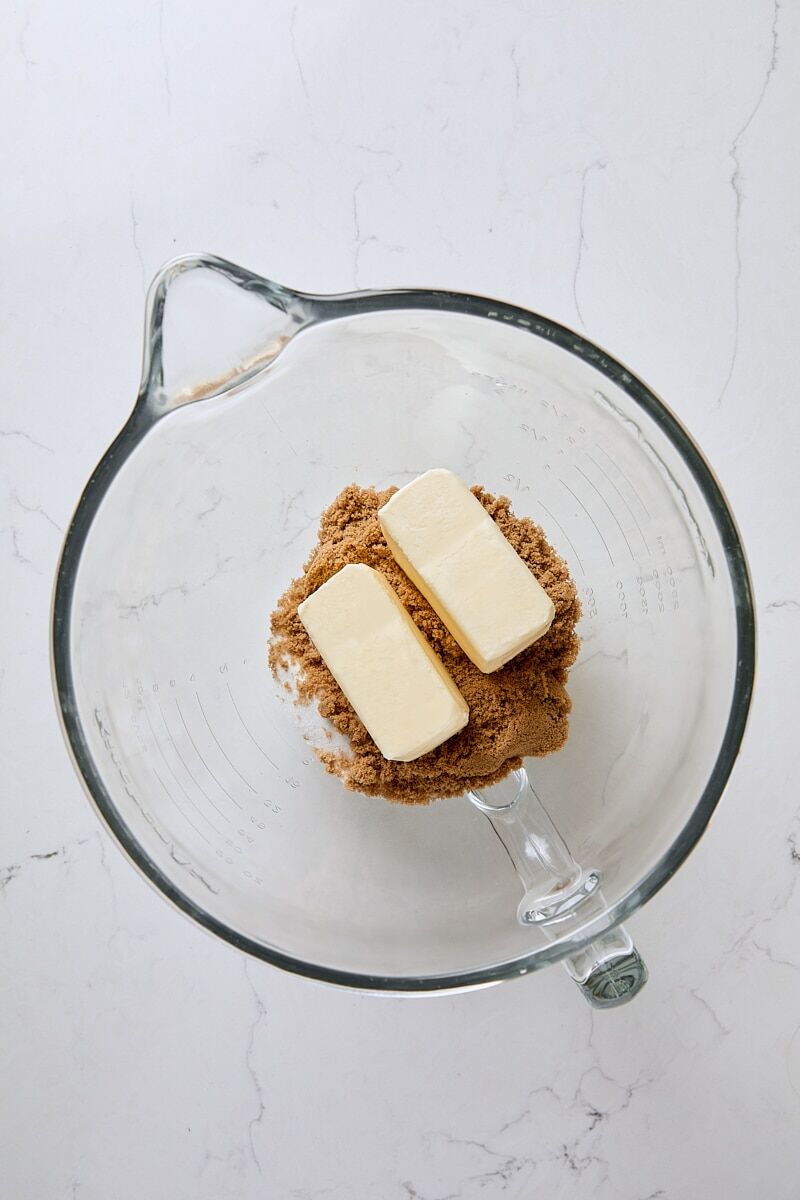 Butter, light brown sugar, and granulated sugar in glass mixer bowl