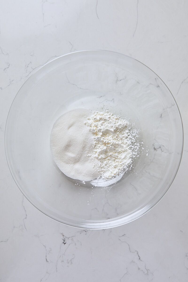 Granulated sugar, arrowroot starch, and salt in large glass bowl