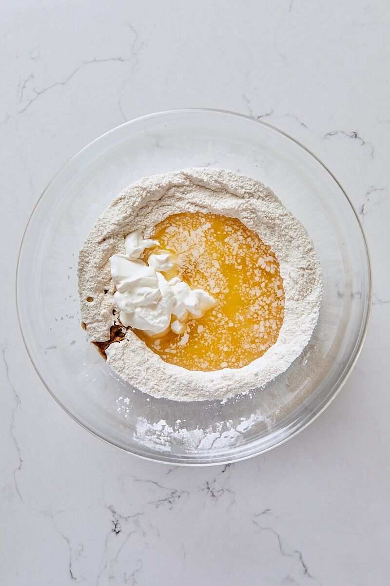 Melted butter, sour cream, and vanilla added to topping ingredients