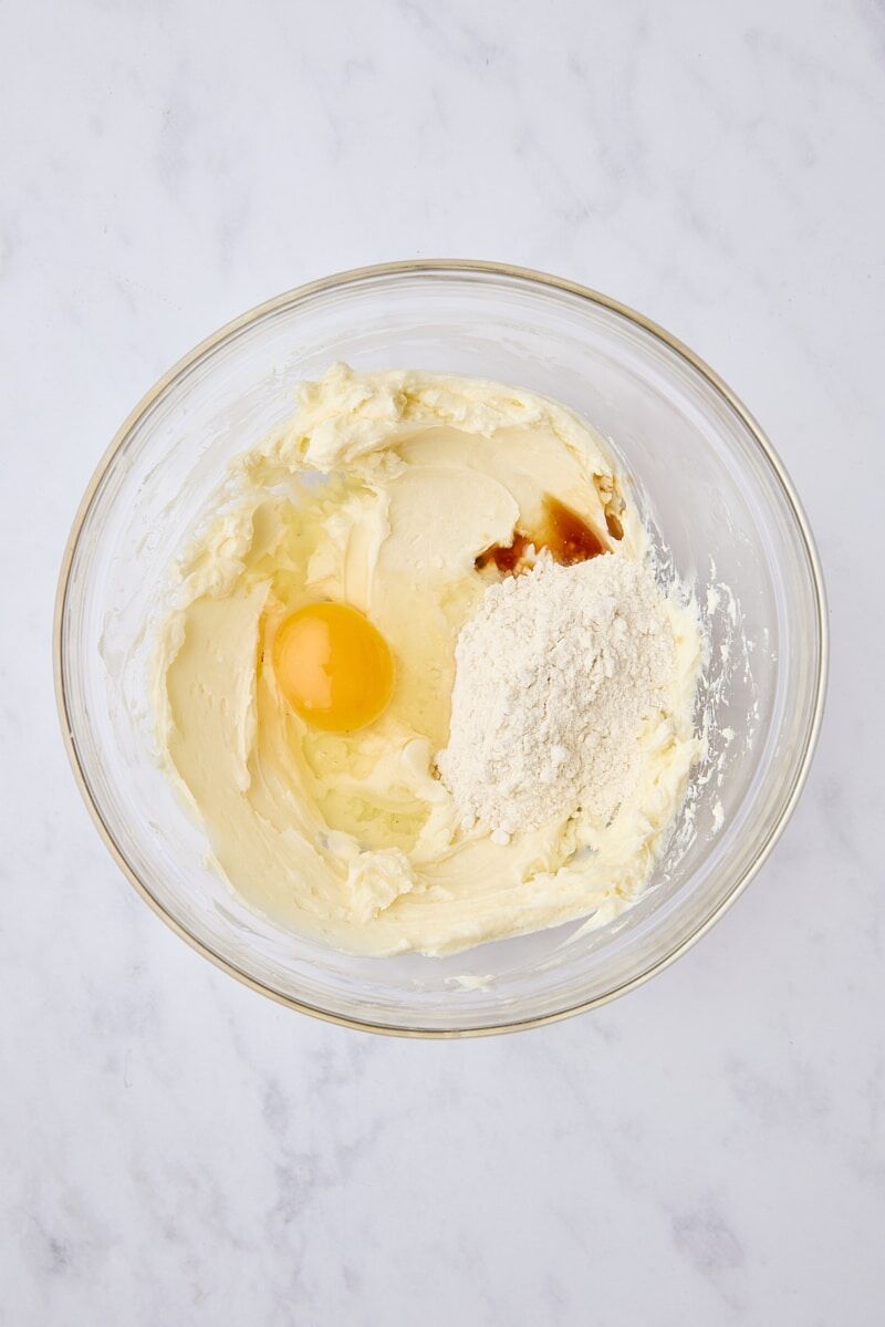 Flour, egg, and vanilla added to cream cheese mixture