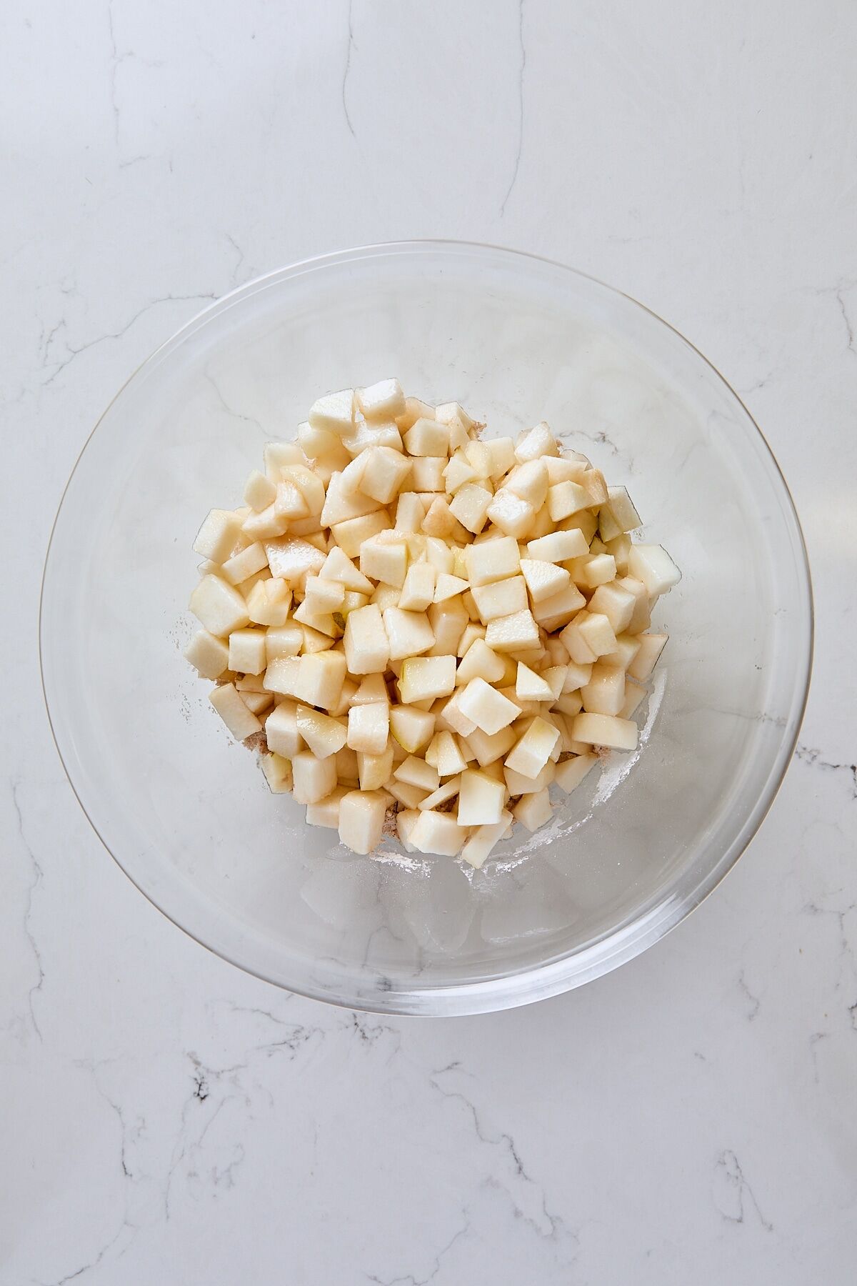 Diced pears and lemon juice added to sugar mixture