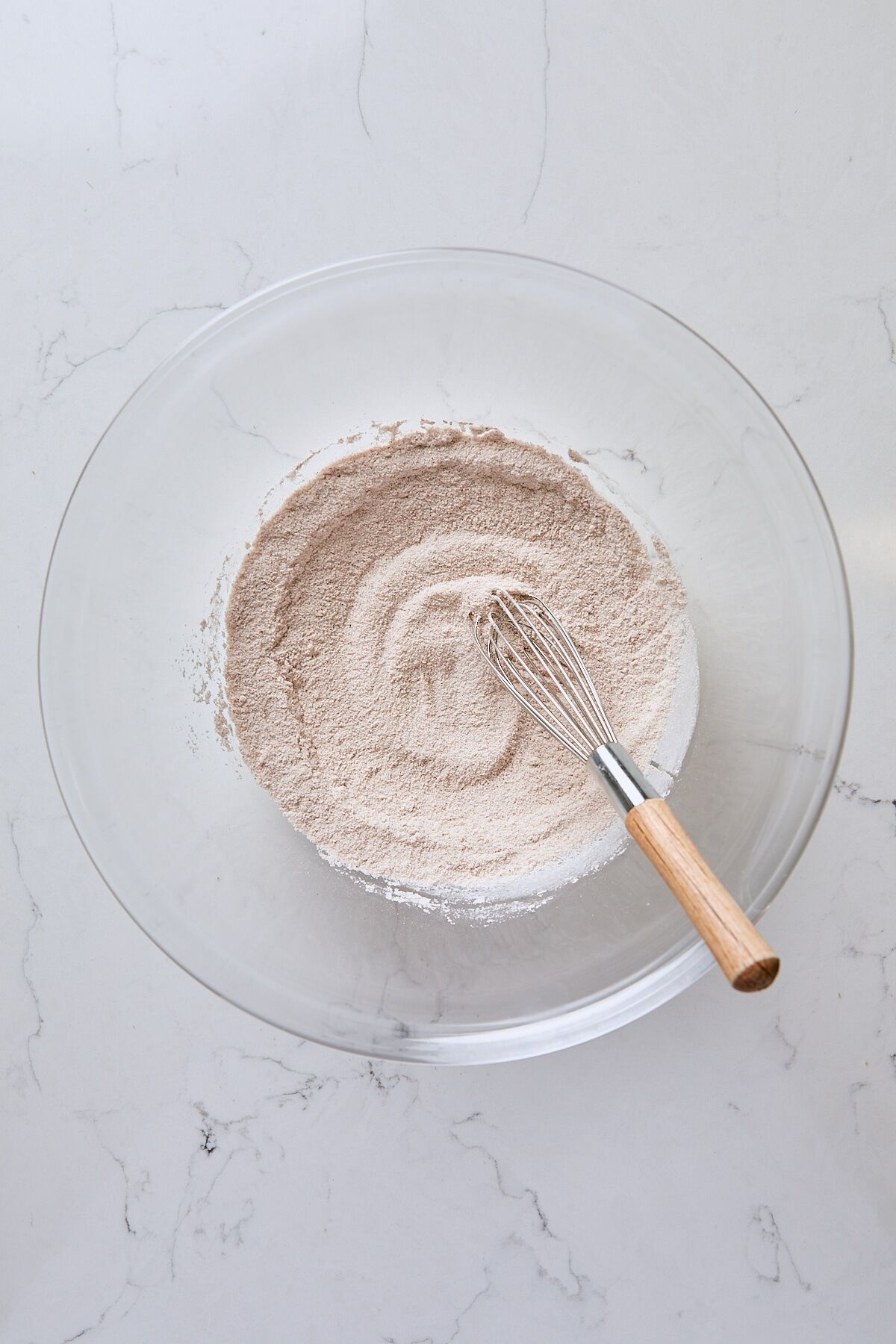 Sugar mixture whisked together in glass bowl