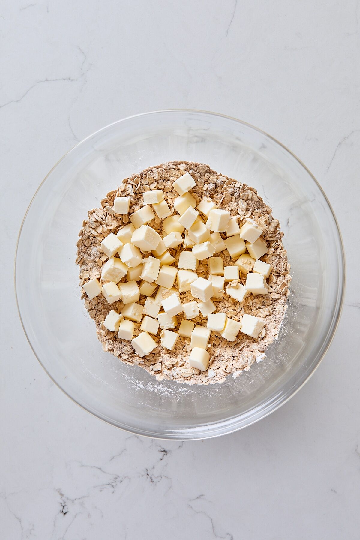 Cold cubed butter added to crisp topping