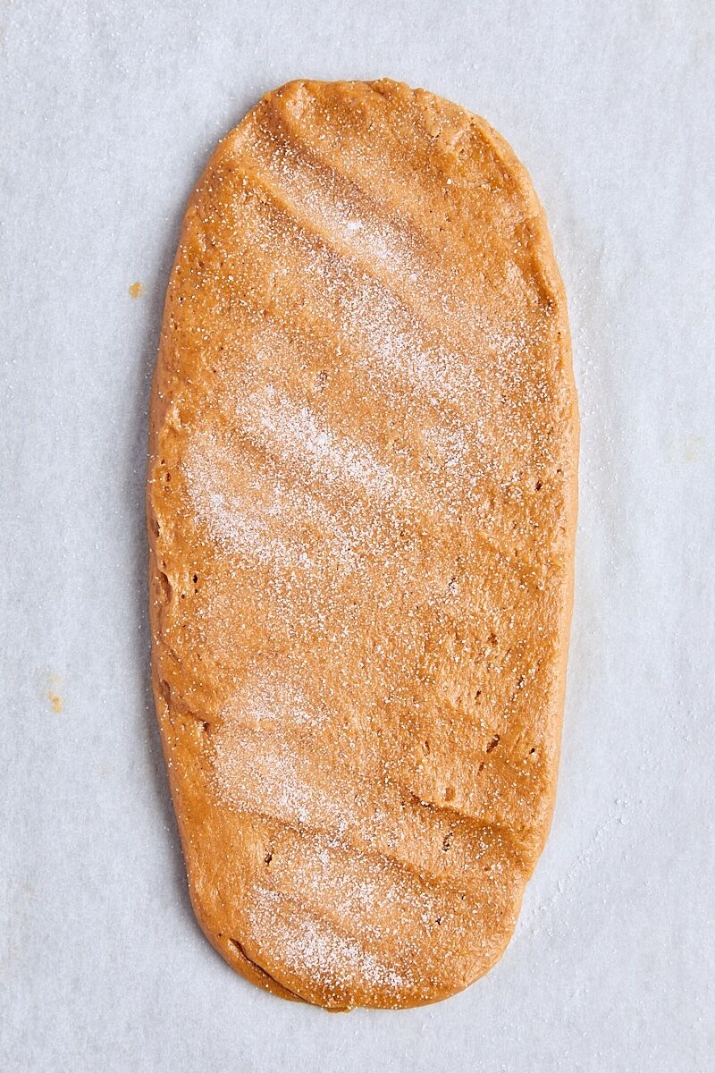 Shaped biscotti on parchment-lined baking sheet