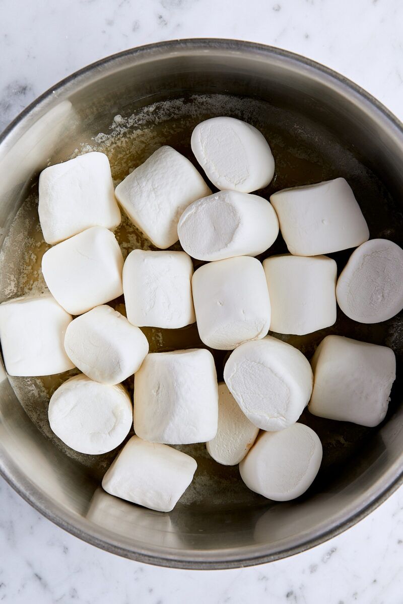 Melted butter and jumbo marshmallows in large pan