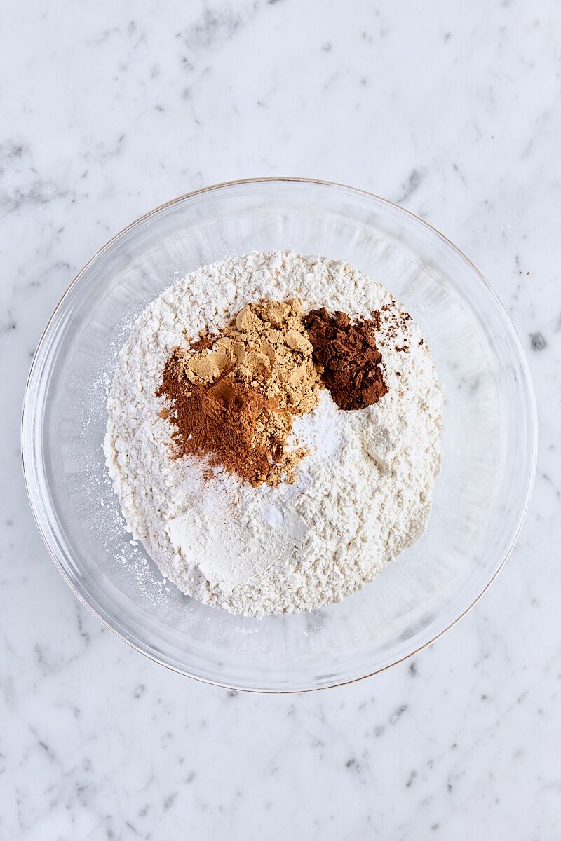 All-purpose flour, baking soda, cornstarch, salt, and spices in medium glass bowl