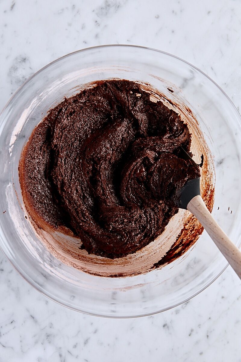 Dry ingredients folded into chocolate mixture with spatula