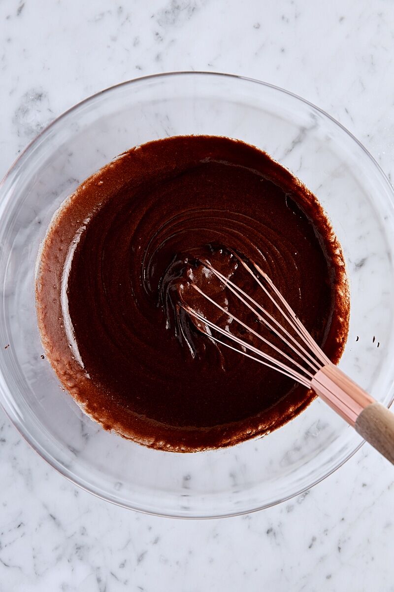 Chocolate mixture whisked into egg mixture until smooth