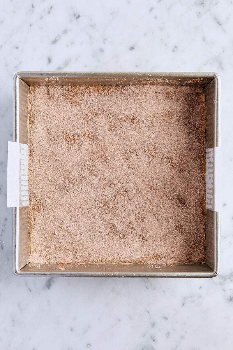 Snickerdoodle dough sprinkled with cinnamon-sugar topping