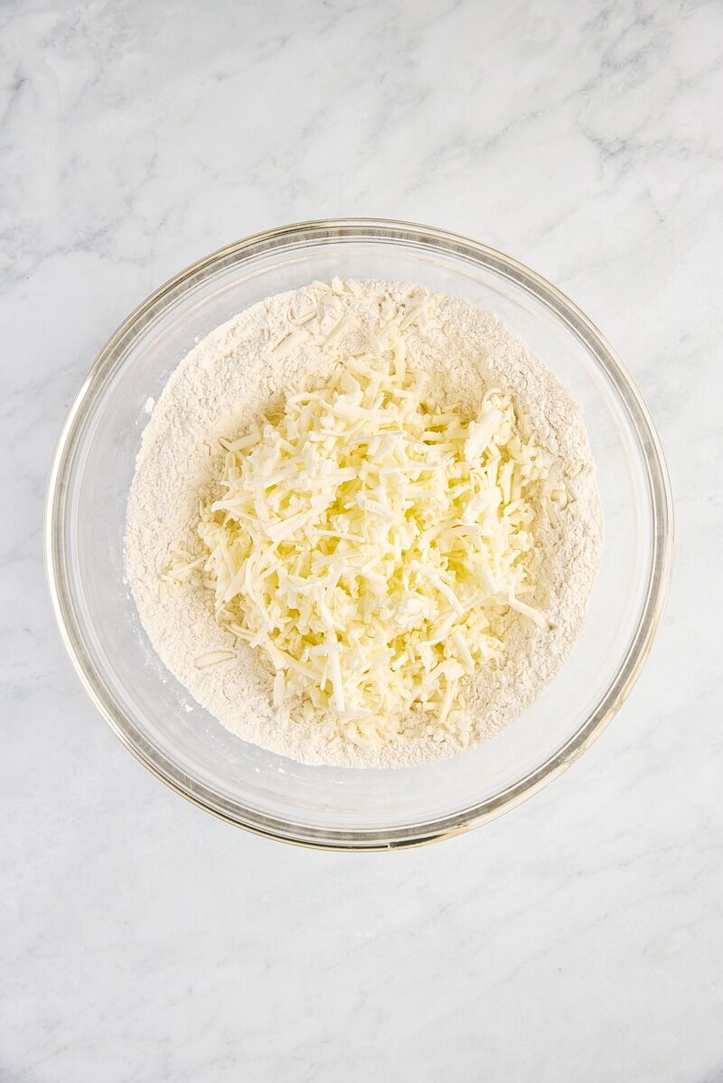 Grated butter added to flour mixture