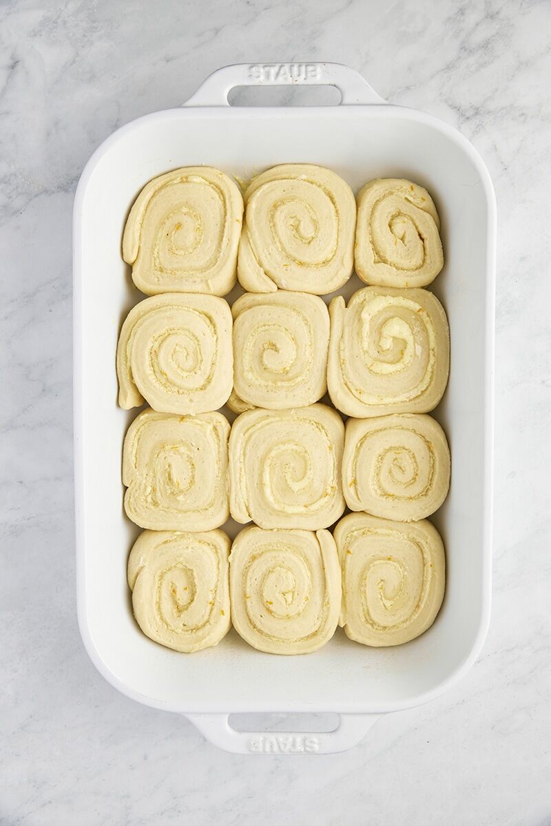 Orange rolls doubled in size after 30 minute rise in ceramic baking dish