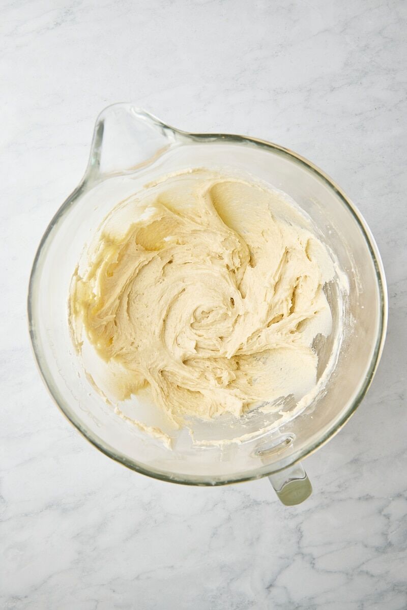 Crumb cake batter in glass mixer bowl