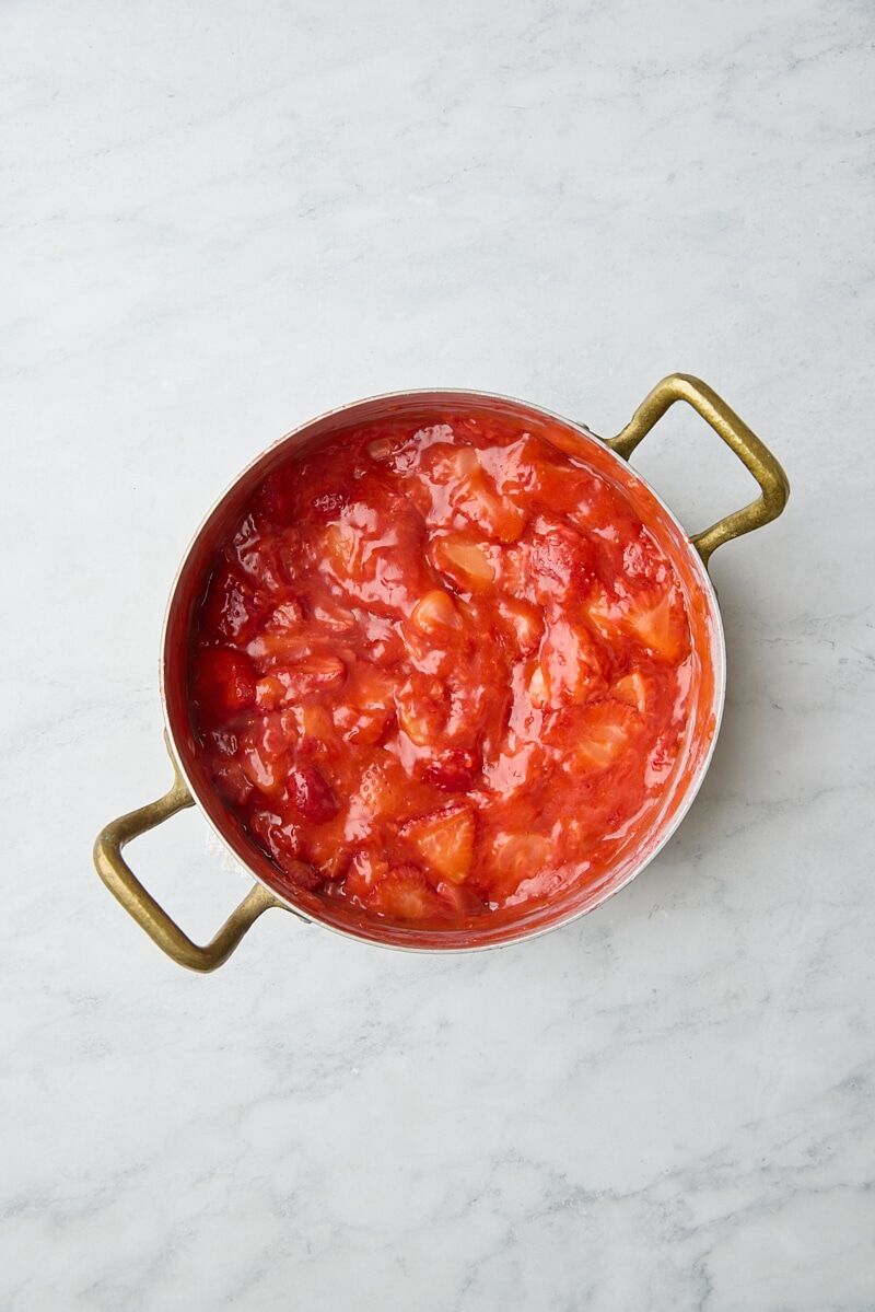 Cooked strawberry filling in saucepan