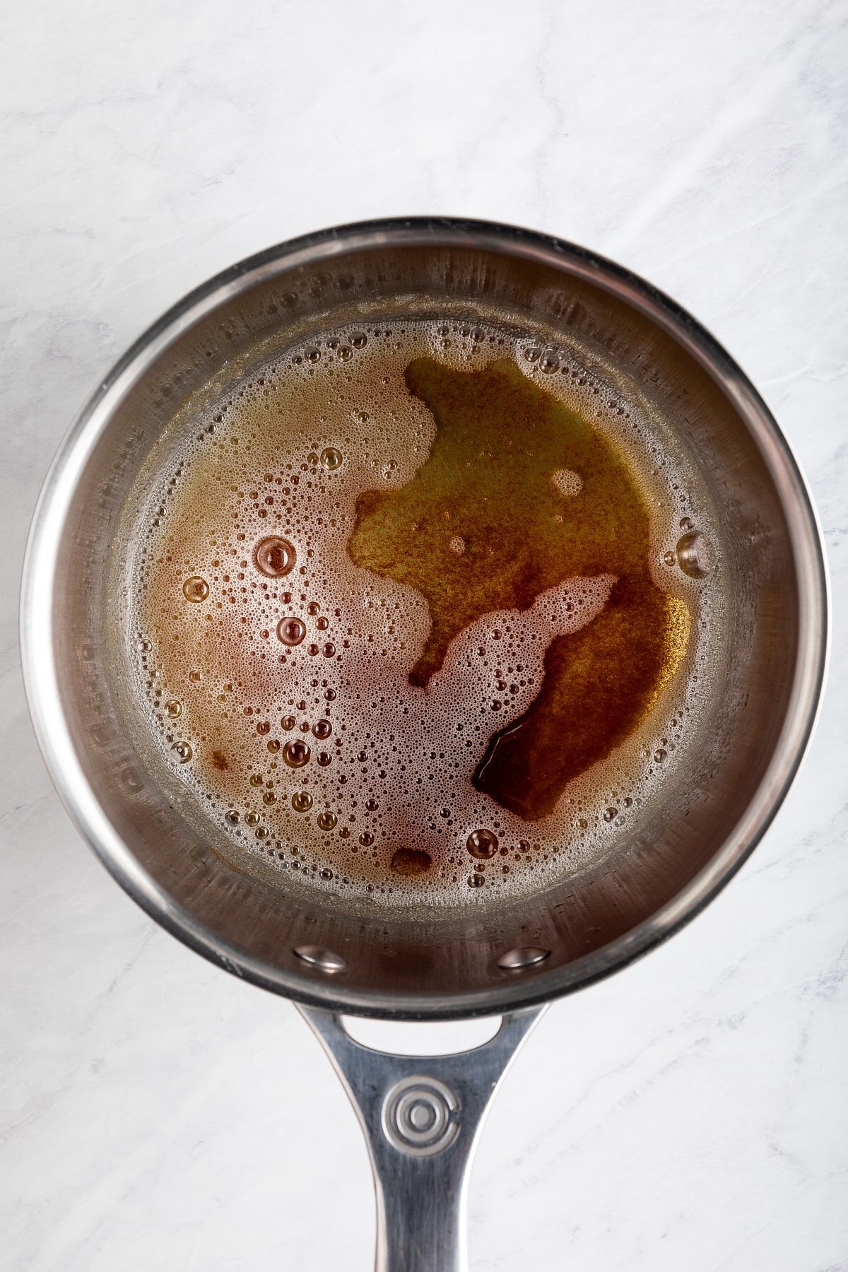 Melted brown butter in saucepan