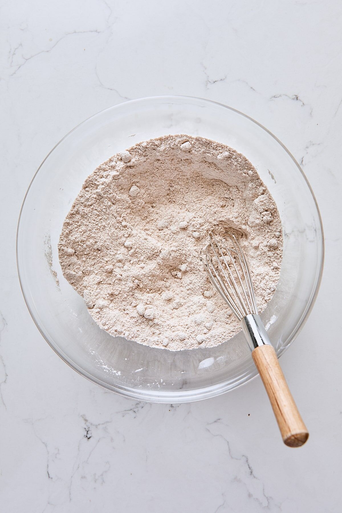 Crumb topping dry ingredients whisked together in glass bowl